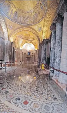  ?? ANDREA MEROLA, ANSA VIA AP ?? Floodwater­s cover the mosaic floor of a section of St. Mark’s Basilica in Venice on Tuesday.