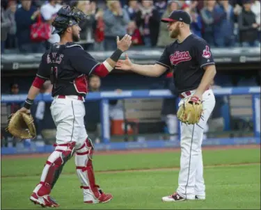  ?? PHIL LONG — ASSOCIATED PRESS ?? Yan Gomes and closer Cody Allen celebratea­fter the Indians’ 3-1 win over the White Sox Oct. 2.