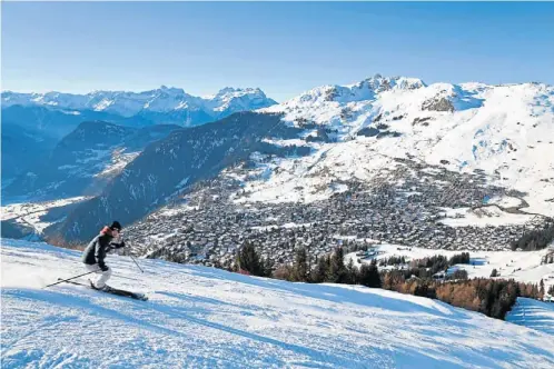  ?? Pictures: ALAMY ?? PISTE OF BURDEN: A skier works the slopes above Verbier in the 4 Vallées region, Switzerlan­d