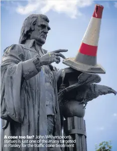  ??  ?? A cone too far? John Witherspoo­n’s statues is just one of the many targeted in Paisley for the traffic cone treatment Proud Buddie Erskine Sent by email