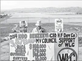  ?? Gina Ferazzi Los Angeles Times ?? RIVERSIDE COUNTY RESIDENT Betty Masters protests the Moreno Valley City Council’s support of Iddo Benzeevi’s proposed World Logistics Center.