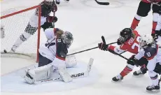  ?? BEN PELOSSE/FILES ?? Canada’s Marie-Philip Poulin scored the tying and winning goals in the goldmedal game at the 2014 Olympics.