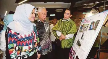  ?? BY LUQMAN HAKIM ZUBIR ?? Prime Minister Datuk Seri Najib Razak and Women’s Innovation Academy cofounder and president Tan Sri Shahrizat Abdul Jalil at the launch of the academy in Kuala Lumpur yesterday. PIC