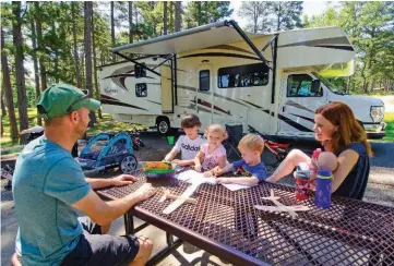  ?? PHOTO COURTESY OF THE ARKANSAS DEPARTMENT OF PARKS, HERITAGE AND TOURISM ?? Camping is a popular activity supported along the McClellan-Kerr Arkansas River Navigation System, and the Corps’ popular campground­s often fill up months in advance.
