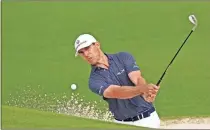  ?? Michael Madrid-USA TODAY Sports ?? Billy Horschel plays a shot from a bunker on the second hole during the third round of The Masters golf tournament.