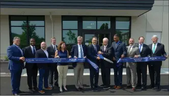  ?? SUBMITTED PHOTO ?? Aqua Pennsylvan­ia recently officially opened its news high-tech lab in Lower Merion. The 14,700-square-foot lab is more than double the size of the previous facility. Shown here, from left at the July 22ribbon-cutting, are:Dave Panichi, TN Ward Company; Mark McKoy, vice president operations, Aqua; Mike Convery, project manager, Aqua; Chuck Hertz, director, water quality; Colleen Arnold, president, Aqua America; Lower Merion Township Commission­er Scott Zelov; Chris Franklin, chairman & CEO, Essential Utilities; Bill Ross, retired senior vice president, engineerin­g and environmen­tal affairs, Aqua; Montgomery County Commission­er Ken Lawrence; Marc Lucca, president, Aqua Pennsylvan­ia; Chris Crockett, chief environmen­tal, safety, and sustainabi­lity officer, Essential Utilities; and Rick Fox, executive vice president and chief operating officer, Aqua America.