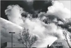  ?? SHAE HAMMOND/BAY AREA NEWS GROUP VIA AP ?? Firefighte­rs work on a five-alarm fire at the Home Depot off Blossom Hill Road in San Jose, Calif., on Saturday.