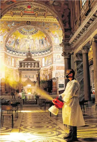  ??  ?? Dark times: A man disinfects the Santa Maria in Trastevere Basilica in Rome, and (left) Florence Nightingal­e.