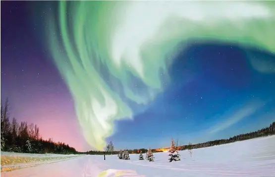  ??  ?? Aurora Borealis near the Arctic.