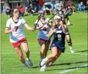  ?? SAM STEWART - DIGITAL FIRST MEDIA ?? Above, Spring-Ford’s Jill Quigley looks for shooting space during the second half of the Rams’ 14-11 victory. Below, Spring-Ford’s Cassie Marte tries to negotiate her way around the Boyertown defense.