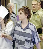  ?? [FILE PHOTO SPECIAL TO THE OKLAHOMAN BY CHAD LOVE] ?? Katherine Rutan, mother of Logan Lynn Tucker, the 6-yearold Woodward boy who disappeare­d in June 2002, is seen Feb. 24, 2006, at her arraignmen­t on a first-degree murder charge.