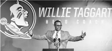  ?? MARK WALLHEISER/ASSOCIATED PRESS ?? Willie Taggart is introduced as FSU’s new football coach in December, just four months after his father died. “He always said, ‘Make sure you take care of your family,’ and that’s something that’s always stuck with me,” Taggart says.