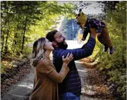  ?? CONTRIBUTE­D ?? Katie and Kyle Williams play with 8-month old son Hudson. Katie was a grant recipient from the Team Maggie nonprofit, which assists in partial funding for the cost of preserving eggs or sperm for young adults with cancer.