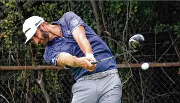  ?? CHARLES REX ARBOGAST / ASSOCIATED PRESS ?? Dustin Johnson aims to win for the second time in seven days and set himself up to be top seed at the Tour Championsh­ip, which would let him start the tourney with a two-shot lead under the staggered start.
