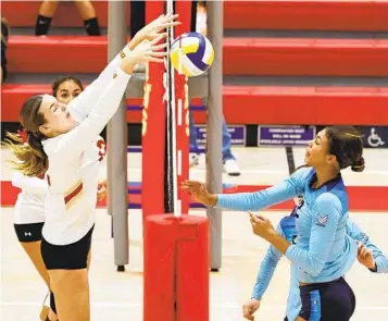  ?? MEG MCLAUGHLIN U-T ?? Cathedral Catholic’s Mae Kordas makes a block during a sweep of Los Angeles Marymount in a Regional Open Division quarterfin­al Wednesday. It was a battle between past the two Open Division state champions.