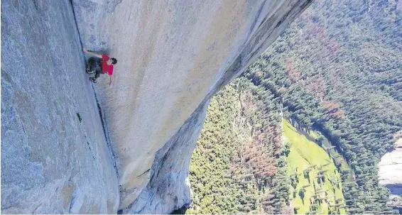  ?? LITTLE MONSTER FILMS ?? Alex Honnold scales the 1,000-metre El Capitan in Yosemite, California, in a scene from Free Solo. Honnold was the first person to climb El Capitan by himself.