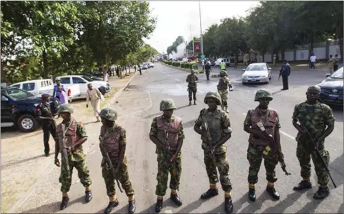  ??  ?? Men of the Nigerian Army on duty