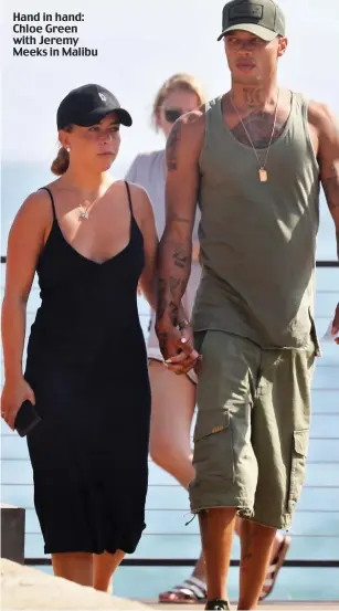  ??  ?? Hand in hand: Chloe Green with Jeremy Meeks in Malibu
