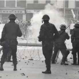  ??  ?? Mayhem: Soldiers face protesters on Bloody Sunday in 1972