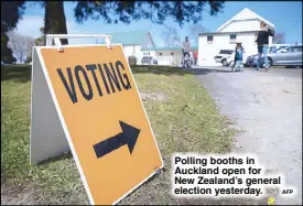  ?? AFP ?? Polling booths in Auckland open for New Zealand’s general election yesterday.