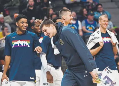  ?? Andy Cross, The Denver Post ?? All-star Nikola Jokic, center, and the Denver Nuggets are having a ball this season. The Nuggets are 37-18, including a 23-4 record at home. Jokic is averaging 20.4 points, 10.5 rebounds and 7.7 assists per game at age 23.