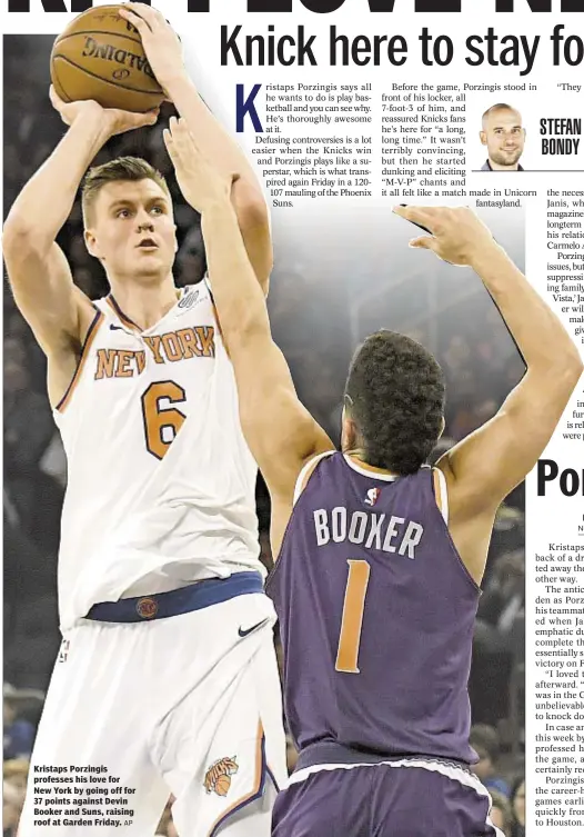  ?? AP ?? Kristaps Porzingis professes his love for New York by going off for 37 points against Devin Booker and Suns, raising roof at Garden Friday.