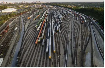  ?? (AP) ?? Freight train cars sit in a Norfolk Southern rail yard in September in Atlanta. President Joe Biden has called on Congress to intervene and block a railroad strike before next month’s deadline in the stalled contract talks.