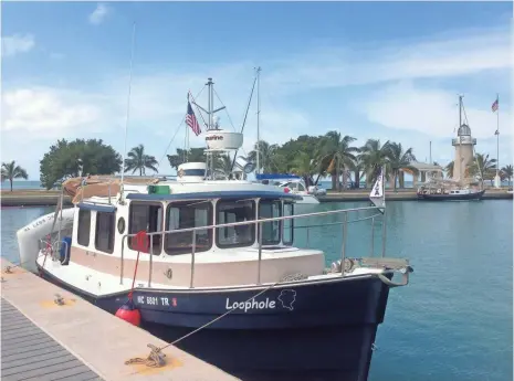  ?? PHOTOS BY MARY ELLEN KETTELHUT ?? Kurt and Mary Ellen Kettelhut’s Loophole, a 25-foot Ranger Tug, tied up in Boca Chita Key in Florida’s Biscayne National Park.