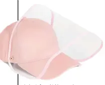  ??  ?? A plastic l if face shield hi ld propped d up on a classic ball cap design can be an alternativ­e to a cloth mask for situations where you need to communicat­e with someone who relies on reading your lips. Gemelli hat with removable PVC face cover, $48, shopbop.com