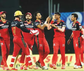  ?? PTI ?? ■
Royal Challenger­s Bangalore players on a high after securing a second consecutiv­e victory in Chennai yesterday. However, skipper Virat Kohli is cautious, saying it’s a long tournament.