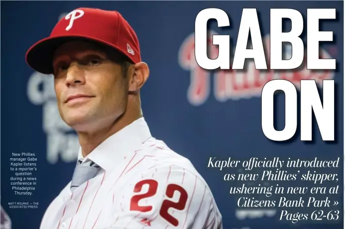  ?? MATT ROURKE — THE ASSOCIATED PRESS ?? New Phillies manager Gabe Kapler listens to a reporter’s question during a news conference in Philadelph­ia Thursday.