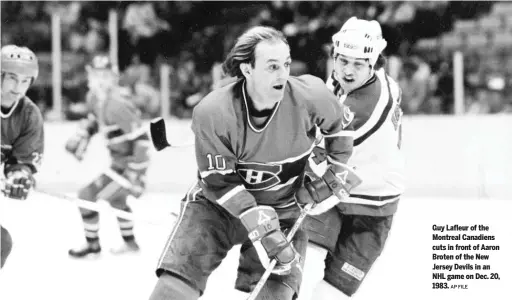  ?? AP FILE ?? Guy Lafleur of the Montreal Canadiens cuts in front of Aaron Broten of the New Jersey Devils in an NHL game on Dec. 20, 1983.