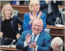  ?? NATHAN DENETTE THE CANADIAN PRESS ?? Premier Doug Ford laughs during question period in the legislatur­e at Queen’s Park on Monday.