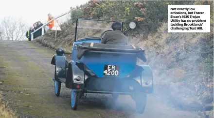  ??  ?? Not exactly low emissions, but Frazer Sloan’s 1925 Trojan Utility has no problem tackling Brooklands’ challengin­g Test Hill.