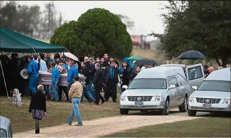  ?? — AFP ?? Sombre affair: The remains of Rodriguez and Therese arriving at the Sutherland Springs Cemetery in Sutherland Springs, Texas.