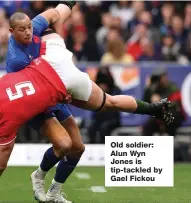  ?? ?? Old soldier: Alun Wyn Jones is tip-tackled by Gael Fickou