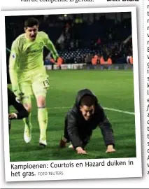  ?? FOTO REUTERS ?? in Kampioenen: Courtois en Hazard duiken het gras.