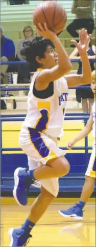  ?? Westside Eagle Observer/MIKE ECKELS ?? Decatur’s Kelvin Moreno goes up for a jump shot late in the fourth quarter of the Decatur-Fayettevil­le Haas Hall conference basketball contest in Decatur Dec. 4.