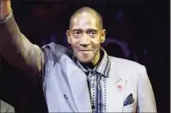  ?? Frank Franklin II / Associated Press ?? Harthorne Wingo waves to the crowd during a ceremony to honor the 1972-73 world champion New York Knicks at New York’s Madison Square Garden on April 5, 2013. The former New York Knick and fan favorite Wingo has died. His death in a New York City hospital on Jan. 13 was confirmed by the coroner’s office. No cause was given.