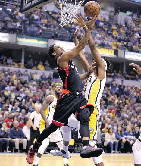  ?? ANDY LYONS/GETTY IMAGES ?? DeMar DeRozan, above, and teammate Kyle Lowry have made 31 per cent of their shots against the Indiana Pacers.