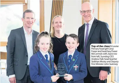  ??  ?? Top of the class St Louise Primary head girl Cerys Fraser and head boy Fraser McCormick with, back row from left, Sumdog CEO Andrew Hall, head teacher Siobhan Mooty and Deputy First Minister John Swinney