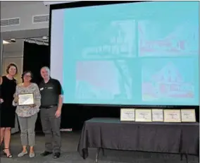  ?? PHOTO PROVIDED ?? Roberta Nahill, center, owner of 121 Circular St, accepts her Porch Restoratio­n Award from Saratoga Springs Preservati­on Foundation Executive Director Samantha Bosshart and foundation board President Matthew Veitch,