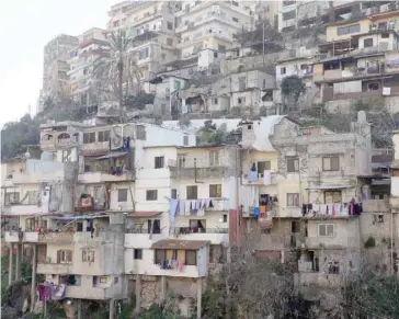  ?? — Reuters ?? A general view shows buildings in Tripoli, Lebanon.