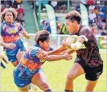  ?? ?? Ruci Tikoi (right) of Lilian Amazon tries to fend off Seahawks halfback Ana Maria Roqica during the Fiji Bitter Nawaka 7s at Prince Charles Park in Nadi yesterday.