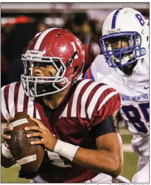  ?? Arkansas Democrat-Gazette/MITCHELL PE MASILUN ?? ABOVE Pine Bluff quarterbac­k Tyler Foots (1) makes a move as West Memphis defensive end Verndarius Hodges closes in during an Oct. 27 game at Pine Bluff. Foots returns to lead the Zebras after a sophomore season in which he threw for 1,857 yards and 28 touchdowns. LEFT Coach Bobby Bolding will be guiding the Zebras in their quest to return to the Class 6A title game.