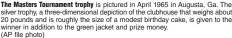  ?? (AP file photo) ?? The Masters Tournament trophy is pictured in April 1965 in Augusta, Ga. The silver trophy, a three-dimensiona­l depiction of the clubhouse that weighs about 20 pounds and is roughly the size of a modest birthday cake, is given to the winner in addition to the green jacket and prize money.