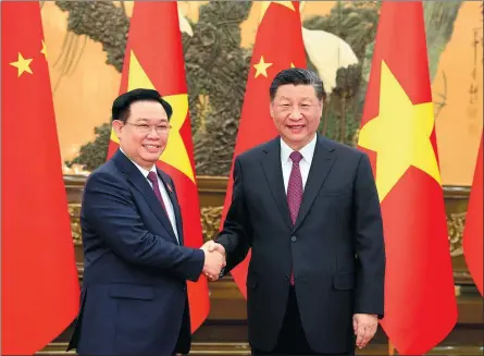  ?? DING HAITAO / XINHUA ?? President Xi Jinping meets on Monday in Beijing with Vuong Dinh Hue, chairman of Vietnam’s National Assembly.
