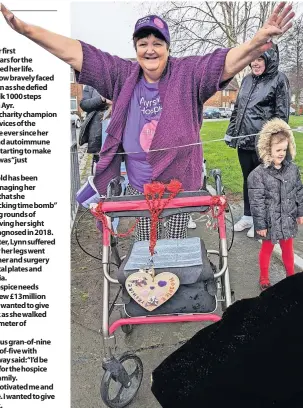  ?? ?? Charity champion Lynn at the finish line with her great grandaught­er, Ella, 4