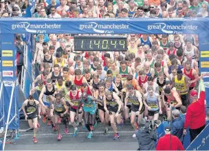  ??  ?? The start of the men’s race at last year’s Great Manchester Run