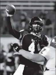  ?? Special to the Democrat-Gazette/JIMMY JONES ?? Charleston quarterbac­k Ty Storey
passed for 378 yards and six touchdowns, which tied the record for a state championsh­ip game.